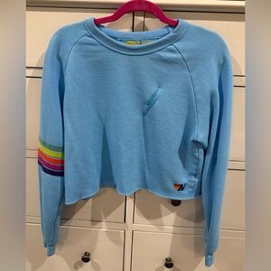 AVIATOR NATION BOLT RUGBY STITCH CROPPED CREW SWEATSHIRT - SMALL - SKY/RAINBOW